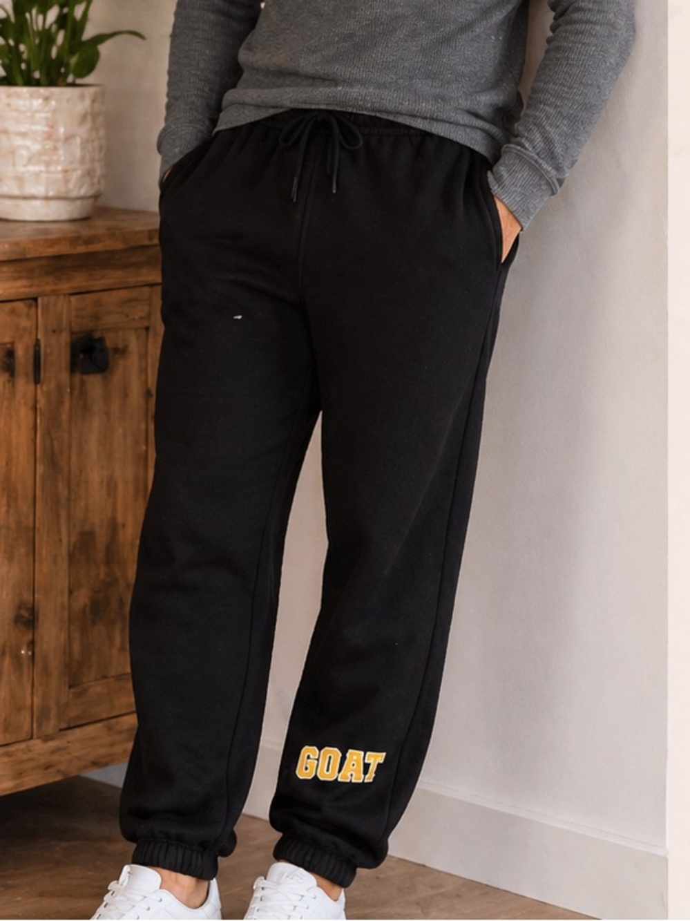 GOAT sneaker Gallery Black Sweatpants with White Logo Tag with pockets MEDIUM
